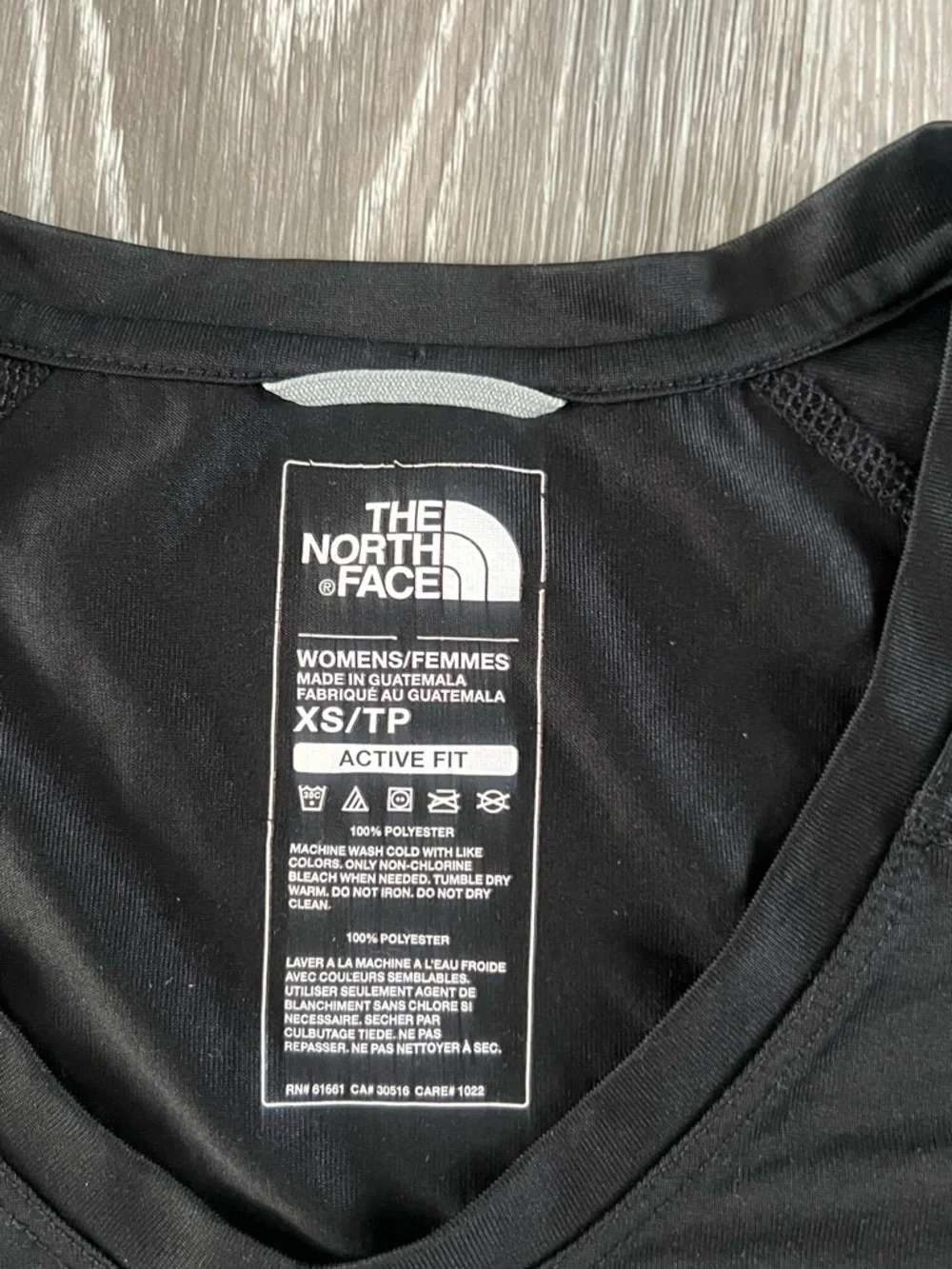 The North Face Women's Black V-Neck Short Sleeve Tee - Picture 4 of 5